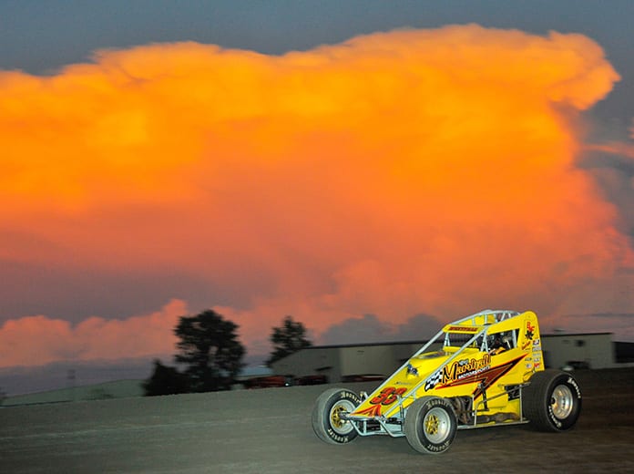 Matt Westfall races under a colorful sky Friday night at Gas City I-69 Speedway. (Randy Crist Photo)