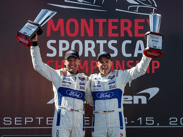 Dirk Mueller and Joey Hand celebrate their GT Le Mans victory Sunday at WeatherTech Raceway Laguna Seca. (Sarah Weeks Photo)
