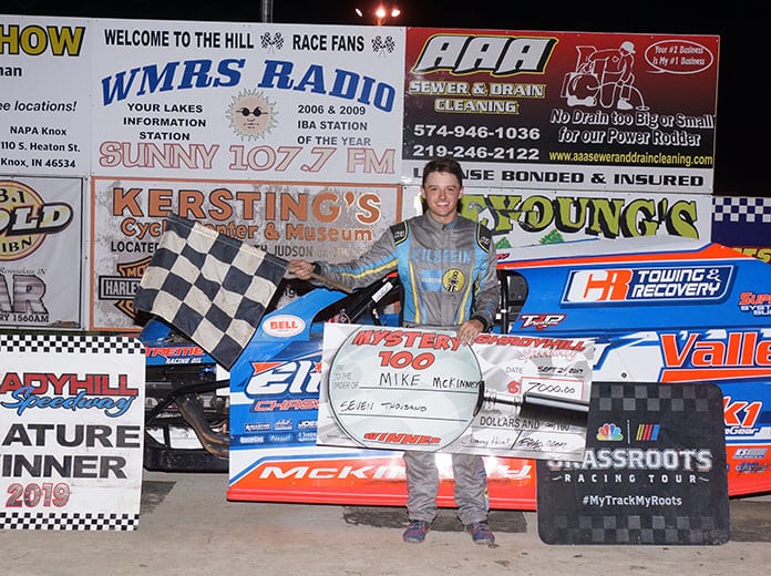 Mike McKinney poses in victory lane after winning the Mystery 100 Saturday at Shadyhill Speedway. (Gary Gasper Photo)