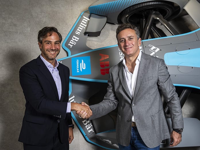 New Formula E CEO Jamie Reigle (left) shakes hands with Formula E Chairman Alejandro Agag. (Formula E Photo)