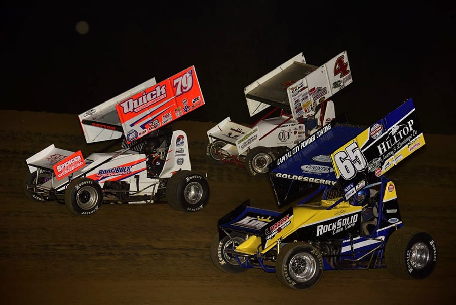 Jacob Patton (49) leads Danny Smith (4) and Jordan Goldesberry during Saturday's Built Ford Tough MOWA Sprint Car Series feature at Spoon River Speedway. (Mark Funderburk Photo)