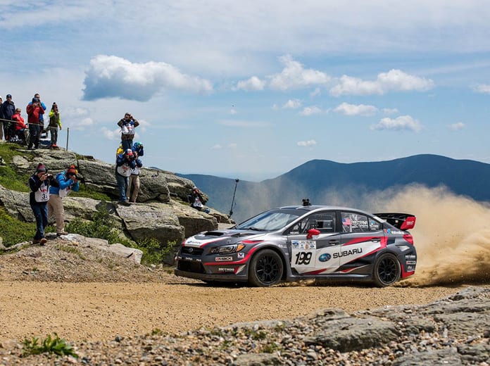 2017 Overall winner and current record holder, Travis Pastrana, is shown rounding the famous Cragway Turn above tree line during the 2017 Subaru Mt. Washington Hillclimb.
