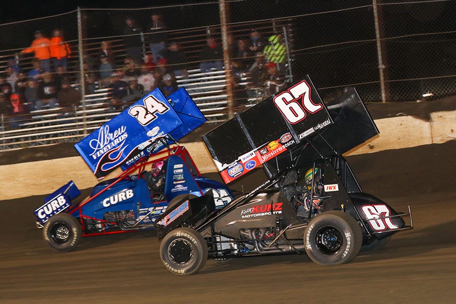 Rico Abreu (24) races ahead of Buddy Kofoid during Saturday's Built Ford Tough MOWA Sprint Car Series feature at Jacksonville Speedway. (Brendon Bauman Photo)