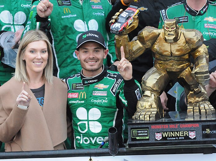 Kyle Larson and his wife, Katelyn, pose in victory lane after Sunday's Drydene 400 at Dover Int'l Speedway. (Dave Moulthrop Photo)