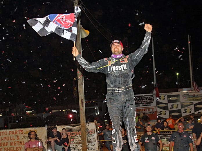 Brandon Overton celebrates his victory in the Mike Duvall Memorial Friday at Cherokee Speedway. (Jim Denhamer Photo)