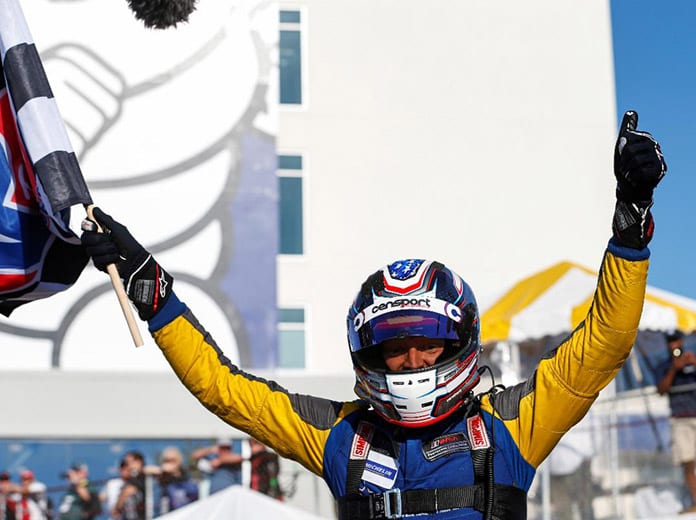 Mike Skeen celebrates after winning Friday's IMSA Prototype Challenge finale at Michelin Raceway Road Atlanta. (IMSA Photo)
