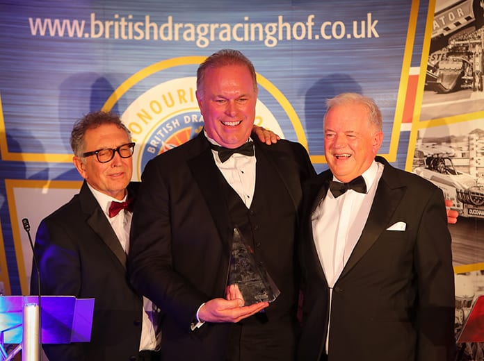 Doug Herbert (center) was recently honored by the British Drag Racing Hall of Fame.