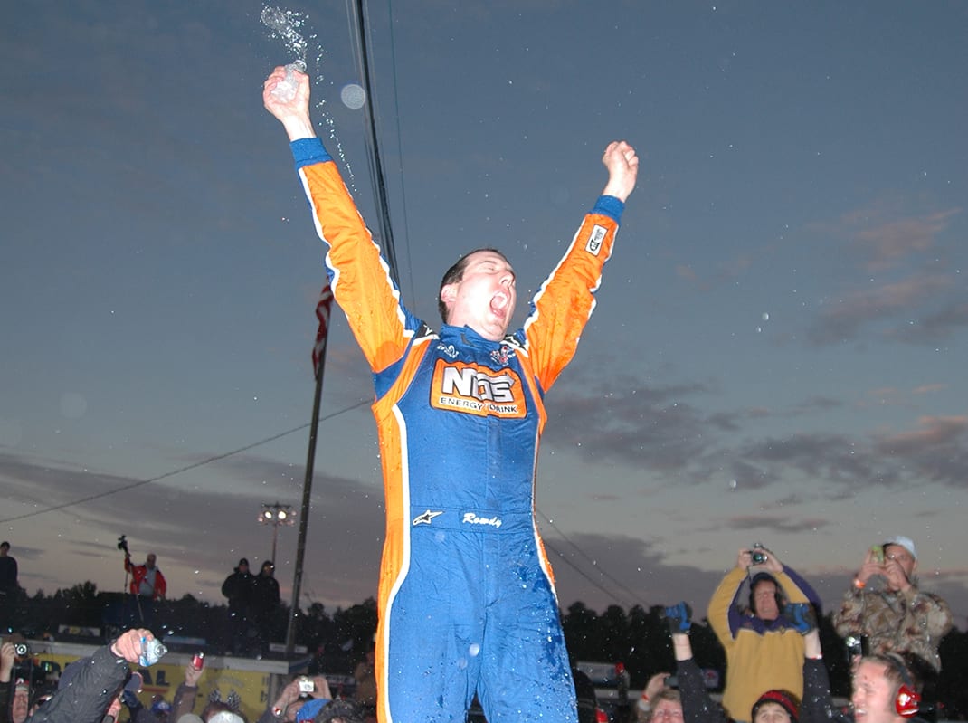 Kyle Busch celebrates one of his victories in the Snowball Derby at Five Flags Speedway. (NSSN Archives Photo)