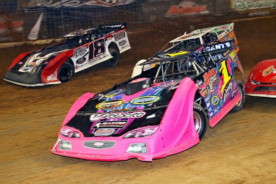 Rusty Schlenk (91) leads a pack of cars during Saturday's Gateway Dirt Nationals finale. (Jim DenHamer photo)