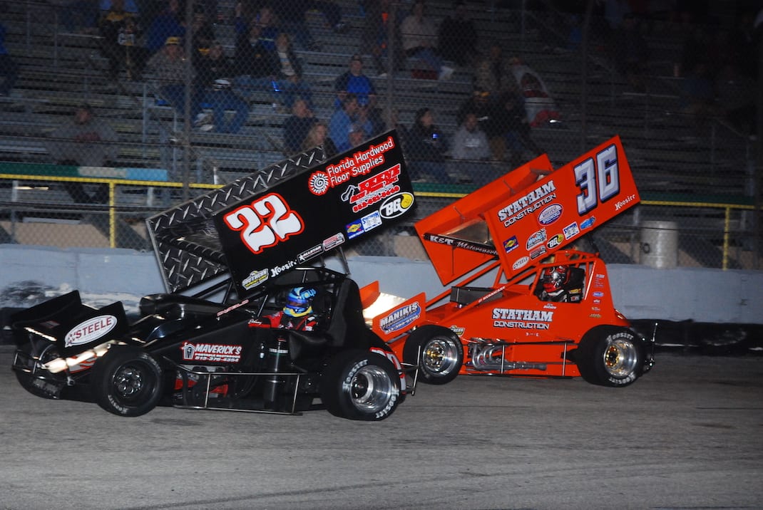 Johnny Gilbertson (22) leads Troy DeCaire at 417 Speedway. (David Sink photo)