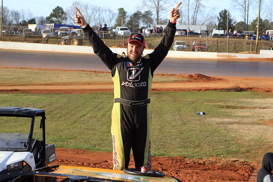 Donald McIntosh celebrates after winning the Hangover super late model feature Saturday at 411 Motor Speedway. (Chad Wells Photo)