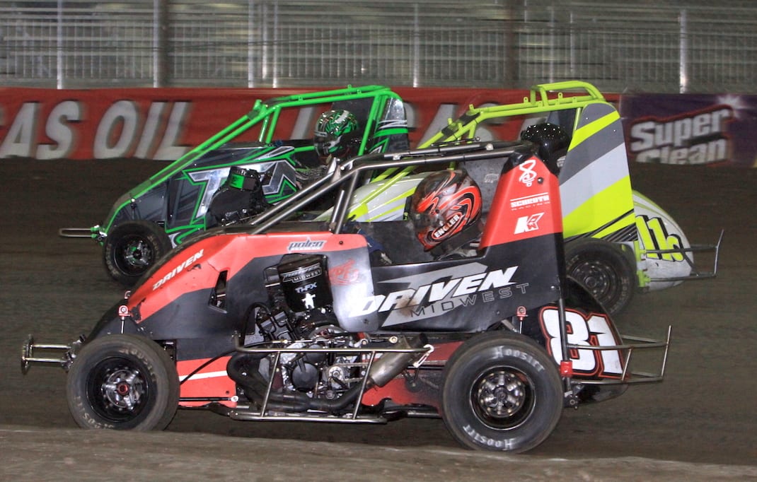 Drivers battle for position during Friday's Tulsa Shootout action. (Richard Bales photo)