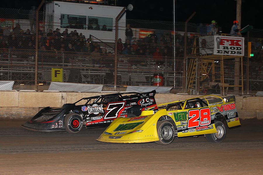 Jimmy Mars (28) challenges Ricky Weiss for position during Wednesday's Wild West Shootout event at Arizona Speedway. (Mike Ruefer Photo)