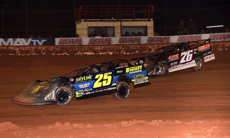 Shane Clanton (25) battles Brandon Overton during Saturday's Lucas Oil Late Model Dirt Series opener at Golden Isles Speedway. (Paul Arch Photo)