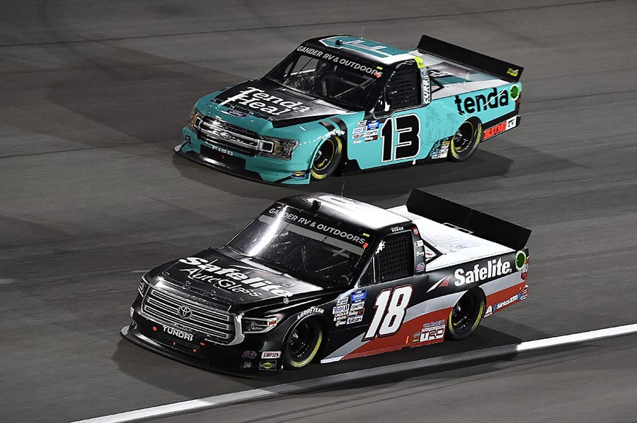 Christian Eckes (18) races ahead of Johnny Sauter during Friday's NASCAR Gander RV & Outdoors Truck Series event at Las Vegas Motor Speedway. (Toyota Photo)