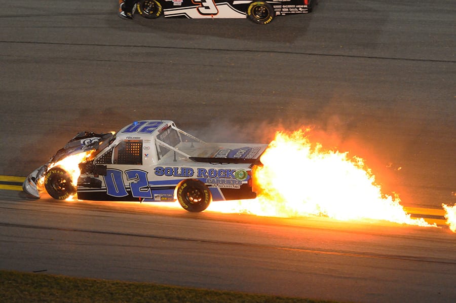 Tate Fogleman's truck bursts into flames after a crash during Friday's NASCAR Gander RV & Outdoors Truck Series opener at Daytona Int'l Speedway. (Dave Moulthrop Photo)