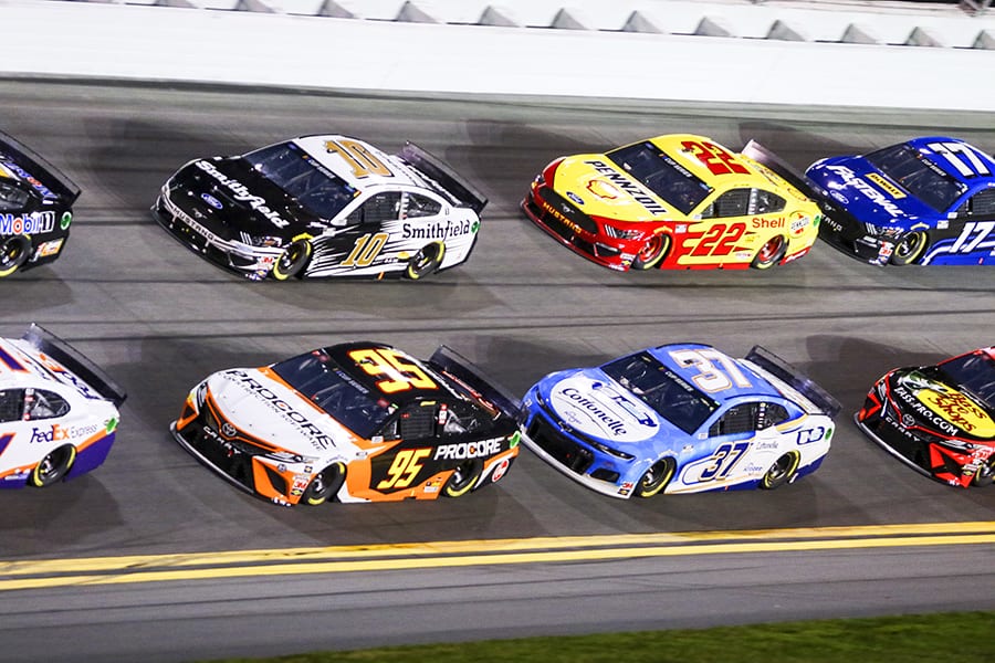 Christopher Bell (95), Aric Almirola (10), Ryan Preece (37) and Joey Logano (22) battle in the pack during the first Bluegreen Vacations Duel Thursday at Daytona Int'l Speedway. (Dave Moulthrop Photo)