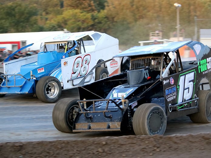 Walter J. Hammond (#98) and Vermont's Adam Pierson (#15) battle through the turns at Devil's Bowl Speedway; the King of Dirt Racing Crate Modified Series will visit the West Haven, Vt., track twice in 2020. (Alan Ward photo)