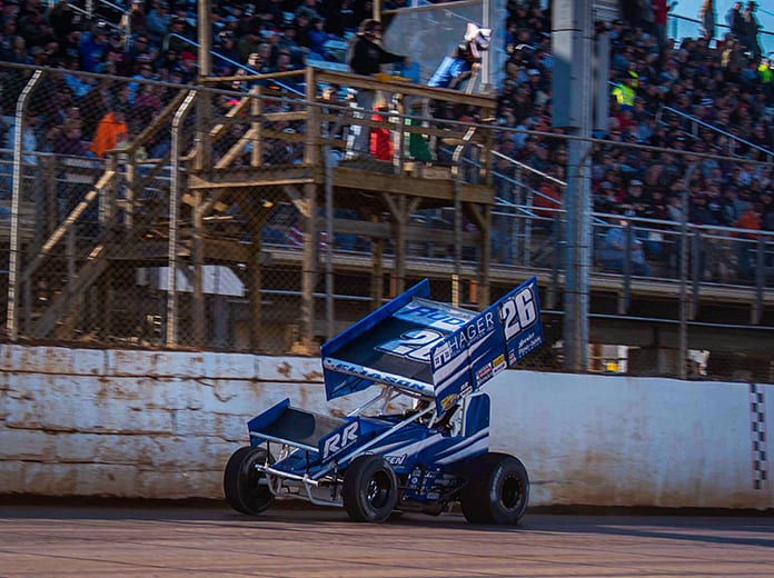 Cory Eliason takes the checkered flag to win Sunday's Port Royal Speedway sprint car feature. (Shawn Cooper Photo)