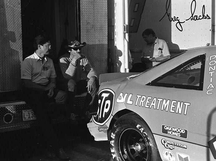 Richard Petty looks at the back of his damaged race car after failing to qualify for a NASCAR Cup Series race at Richmond Raceway in March of 1989. (Chris Economaki Photo)