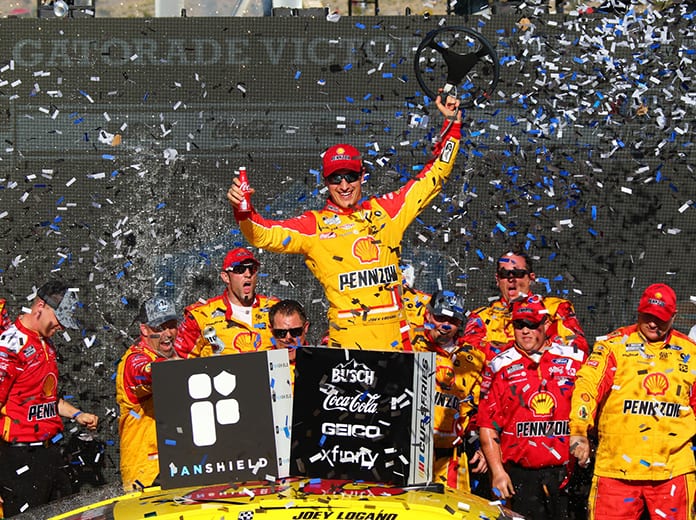 Joey Logano celebrates in victory lane after winning Sunday's NASCAR Cup Series race at Phoenix Raceway. (Ivan Veldhuizen Photo)