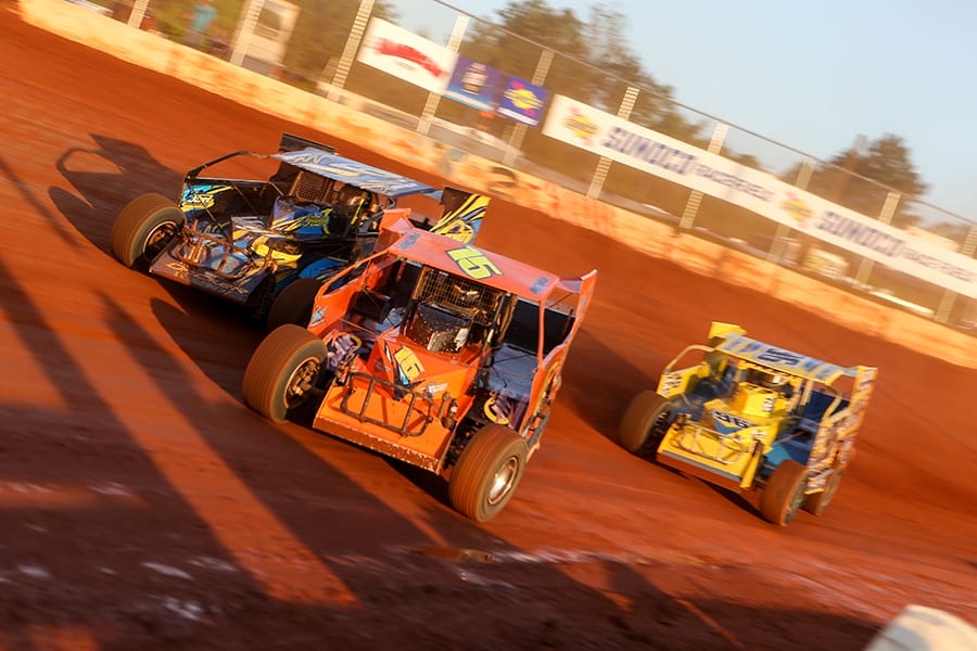 Brett Tonkin (15) races ahead of Billy Decker (91) and Billy Pauch Jr. during Short Track Super Series preliminary action on Saturday at Cherokee Speedway. (Adam Fenwick Photo)