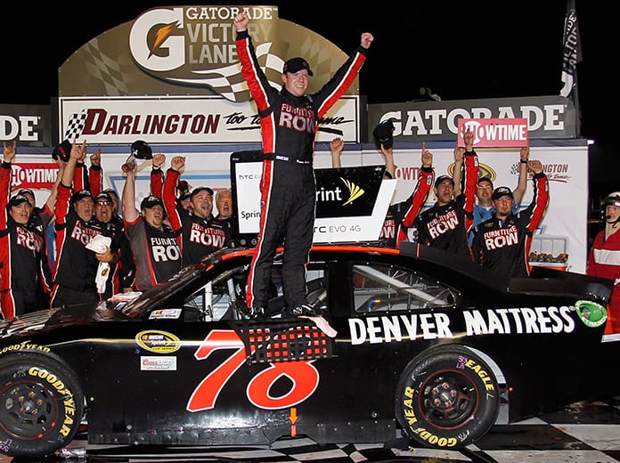 Regan Smith celebrates after winning the 2011 Southern 500 at Darlington Raceway. (NASCAR Photo)