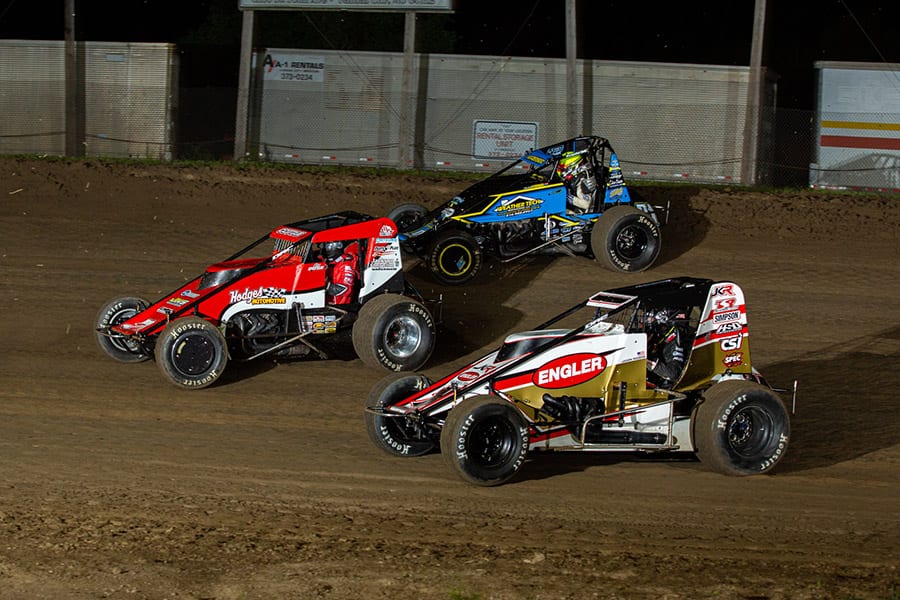 Shane Cottle (74x) leads Jadon Rodgers (14) and Riley Kreisel during Saturday's POWRi Lucas Oil WAR Sprint League event at Valley Speedway. (Russell Moore Photo)