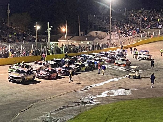 Cars line up on the frontstretrch prior to Sunday's season opener at Slinger Super Speedway. (Nick Dettmann Photo)