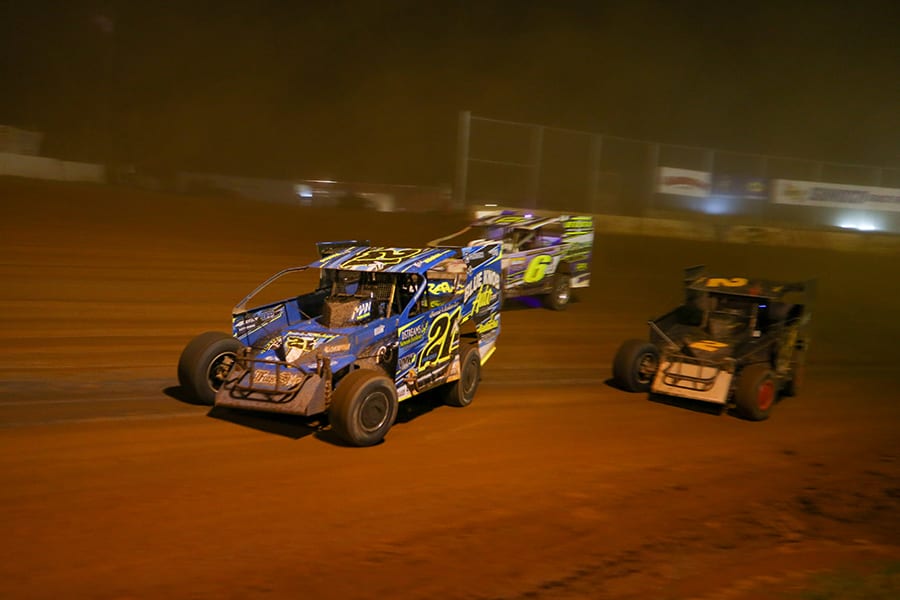 Kyle Weiss (21k) leads Mike Franz (2) and J.R. Hulbert during Short Track Super Series preliminary action on Saturday at Cherokee Speedway. (Adam Fenwick Photo)