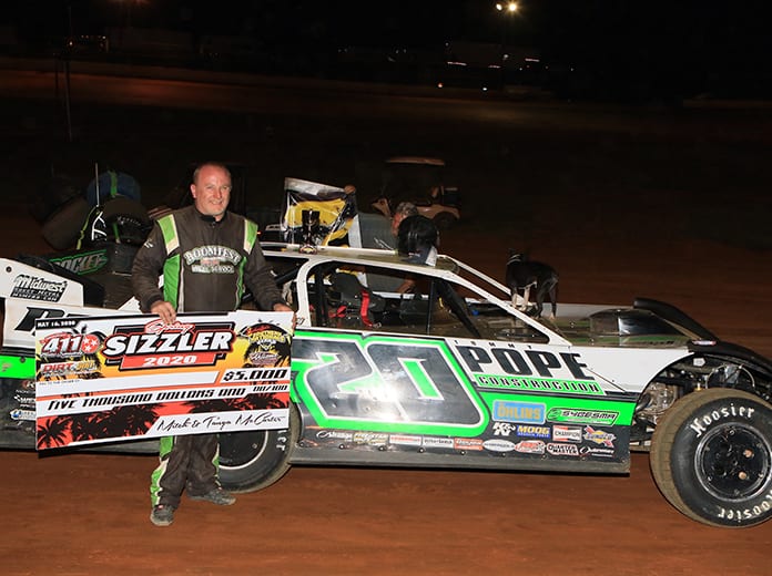 Jimmy Owens in victory lane Saturday night at 411 Motor Speedway. (Chad Wells Photo)
