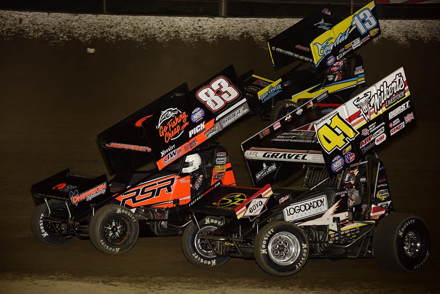 David Gravel (41), Lynton Jeffrey (83) and Paul McMahan battle for position during Saturday's World of Outlaws NOS Energy Drink Sprint Car Series feature at Federated Auto Parts Raceway at I-55. (Mark Funderburk Photo)