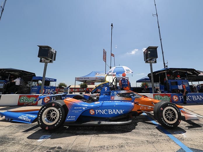 Scott Dixon looks over his race car during NTT IndyCar Series practice on Saturday at Texas Motor Speedway. (IndyCar Photo)