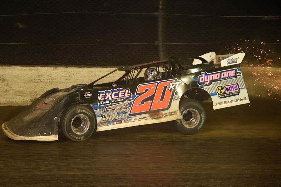 Ricky Thornton Jr. taps the wall in a shower of sparks during Saturday night's Dirt Late Model Stream Invitational finale at Eldora Speedway. (Paul Arch photo)