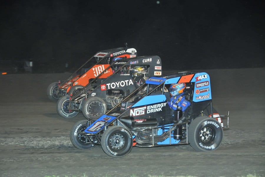 Ricky Stenhouse Jr. (17), Cannon McIntosh (71k) and Kaylee Bryson battle during Wednesday's Indiana Midget Week feature at Gas City I-69 Speedway. (Randy Crist photo)