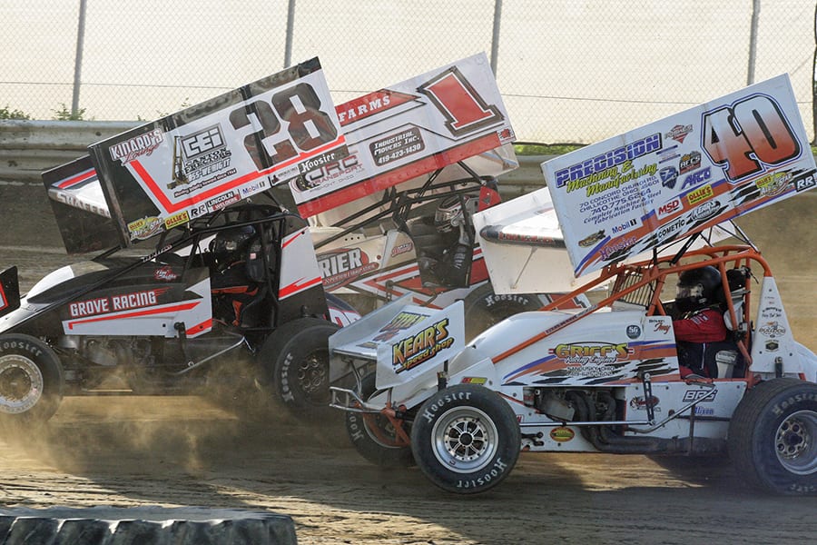Nate Dussel (1), Tim Shaffer (28), and Mark Imler (40) race for position during a heat race as part of Saturday's Ohio Valley Sprint Car Ass'n event at Wayne County Speedway. (Todd Ridgeway Photo)