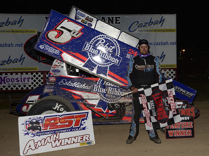 Lucas Wolfe in victory lane Wednesday at Land of Legends Raceway. (Don Romeo Photo)
