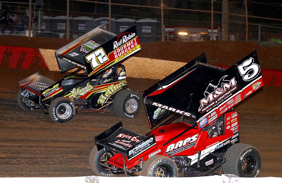 Brent Marks (5) battles Ryan Smith during Monday's PA Speedweek feature at Lincoln Speedway. (Dan Demarco Photo)