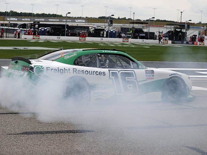 A.J. Allmendinger celebrates with a burnout after winning Saturday's NASCAR Xfinity Series race at Atlanta Motor Speedway. (Kevin C. Cox/Getty Images Photo)