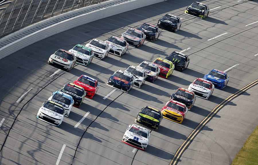 Justin Haley (11) leads the pack during Saturday's NASCAR Xfinity Series Unhinged 300 at Talladega Superspeedway. (Brian Lawdermilk/Getty Images Photo)
