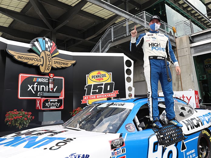 Chase Briscoe poses in victory lane after winning Saturday's Pennzoil 150 on the Indianapolis Motor Speedway road course. (IMS Photo)