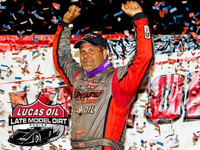 Earl Pearson Jr. celebrates his victory on Friday at Florence Speedway.