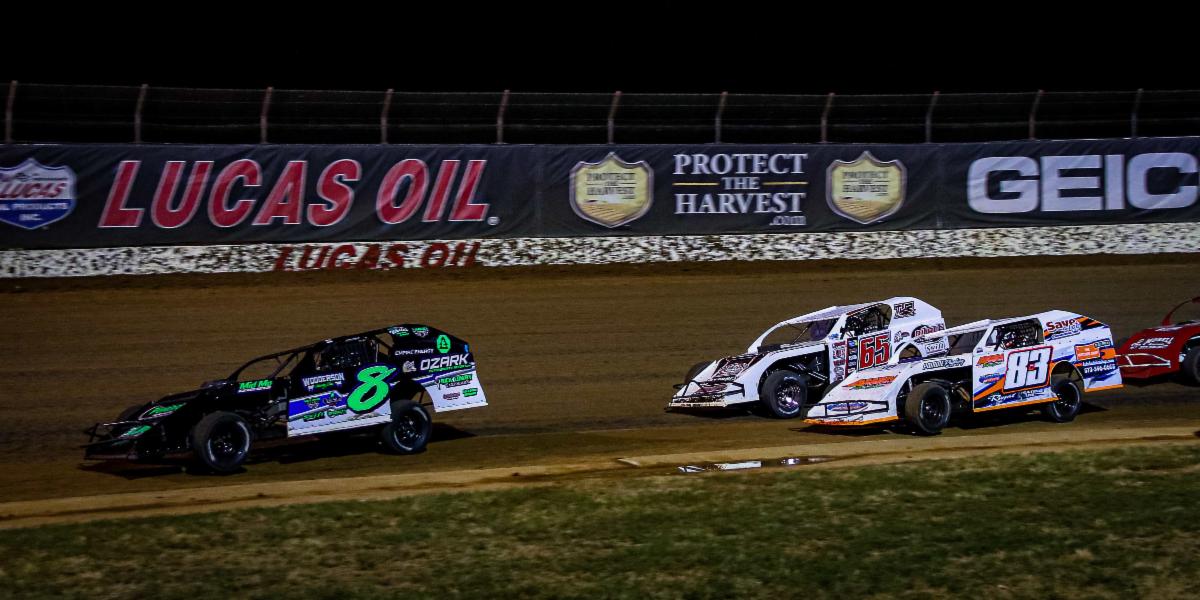 Dillon McCowan (8) leads Kris Jackson (65) and JC Newell (83) on Saturday night at Lucas Oil Speedway. (GS Stanek Racing Photography)