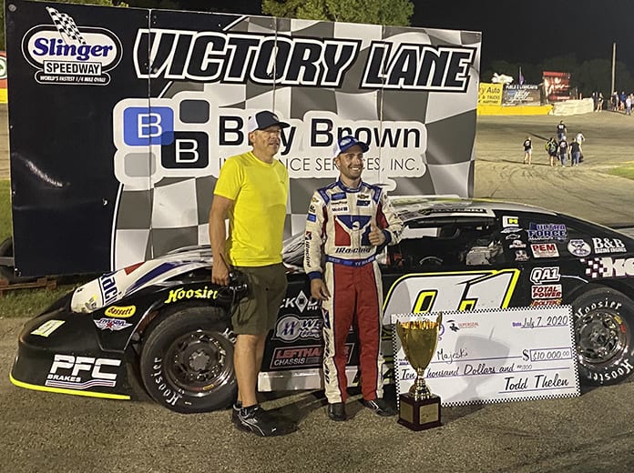 Ty Majeski (right) poses in victory lane with Slinger Super Speedway promoter Todd Thelen after winning the 41st Slinger Nationals. (Nicholas Dettmann Photo)