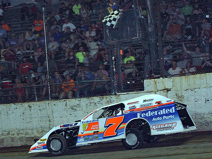 Nick Hoffman takes the checkered flag to win Wednesday's DIRTcar Summit Racing Equipment Modified event at LaSalle Speedway. (Jim Denhamer Photo)