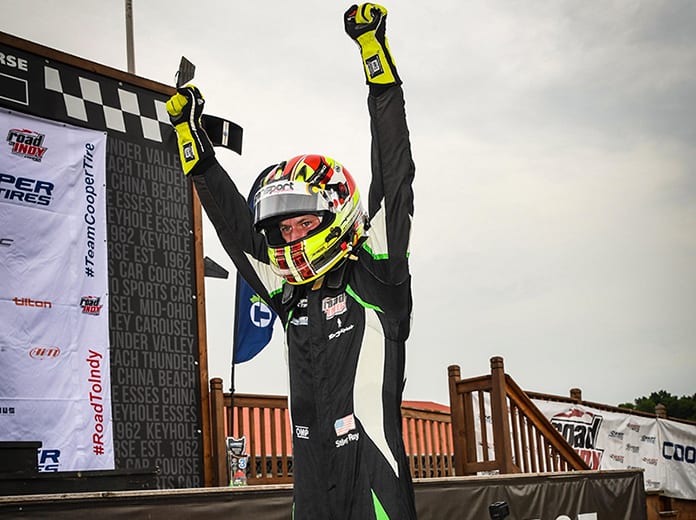 Sting Ray Robb celebrates his maiden Indy Pro 2000 victory Thursday at the Mid-Ohio Sports Car Course.