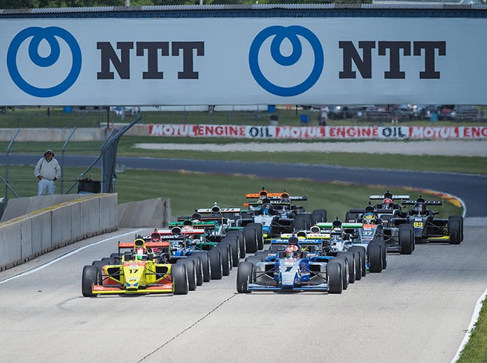 Danial Frost and Artem Petrov each won an Indy Pro 2000 event Friday at Road America.