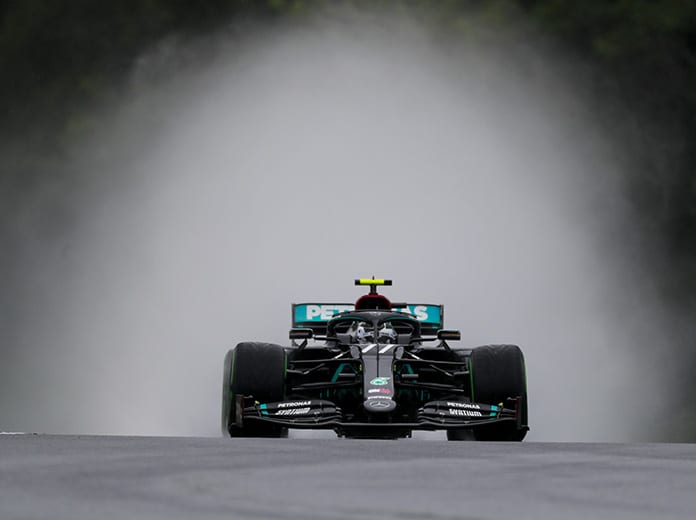 Valtteri Bottas throws up a water spray during the wet second practice Friday at the Hungaroring. (LAT Images Photo)