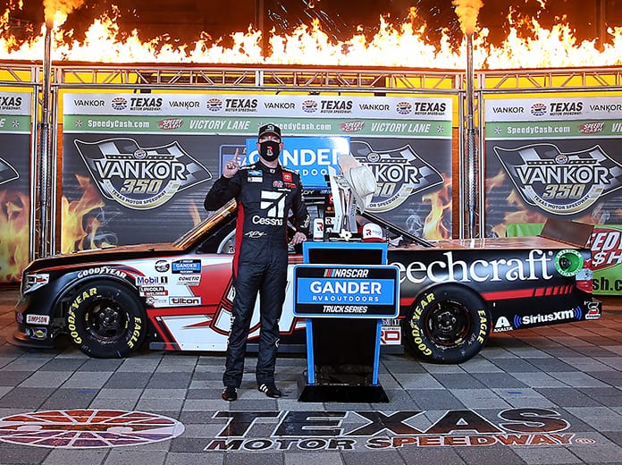 Kyle Busch in victory lane following his NASCAR Gander RV & Outdoors Truck Series victory Saturday at Texas Motor Speedway. (Chris Graythen/Getty Images Photo)