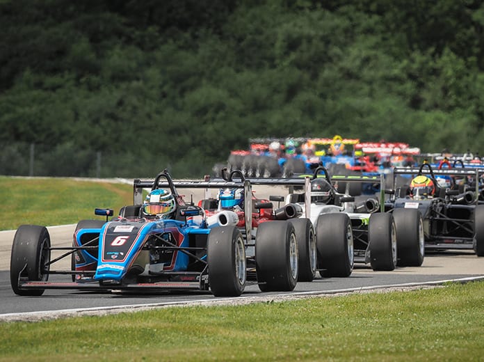 Christian Rasmussen (6) leads the field during USF2000 competition Friday at Road America.